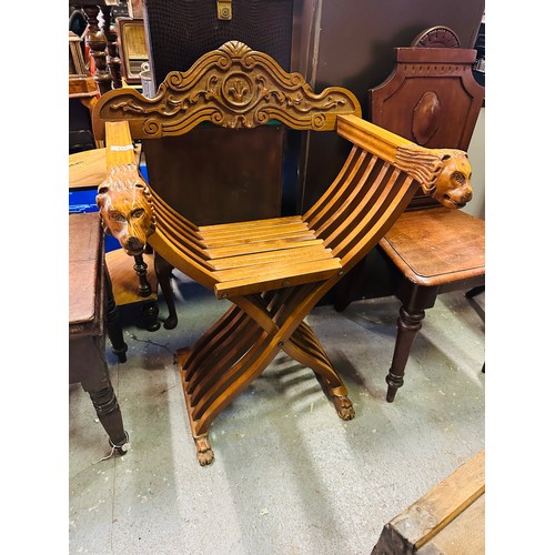 112 - Roman style carved folding chair, 19'' seat h