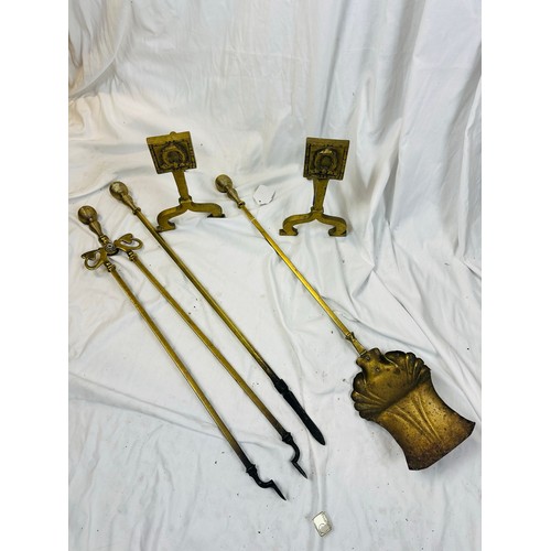 129 - A set of 3 Victorian heavy brass fire irons and a pair of brass fire dogs