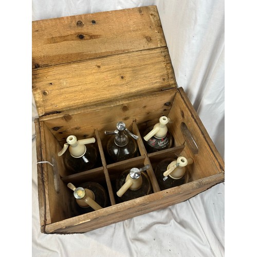 137 - Schweppes vintage timber crate and 6 soda siphons