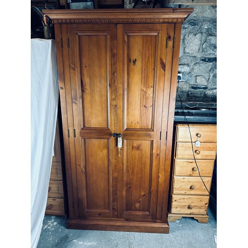 157 - A quality 2 door pine wardrobe in excellent condition, 23''d x 44''w x 79''h