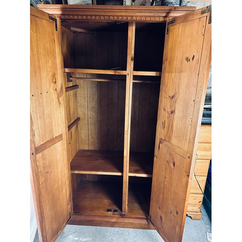 157 - A quality 2 door pine wardrobe in excellent condition, 23''d x 44''w x 79''h