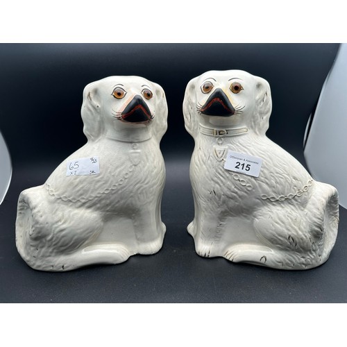 215 - A pair of Victorian China dogs, 9''h