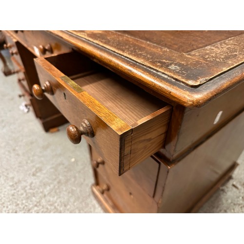 338 - Victorian knee hole writing desk with Rexine inset, 121cm w