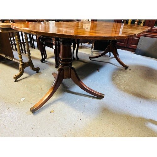 276 - Mahogany dining table on 2 pods with castors and two leaves, 87'' x 42''w x 29''h