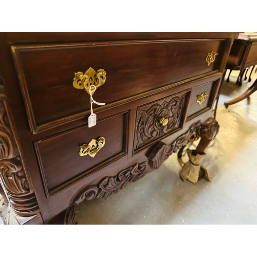 282 - One drawer over three chest of drawers profusely carved on ball and claw feet, 36''w x 17''d x 31''h