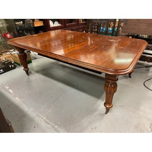 95 - Large mahogany rectangular dining table on castors