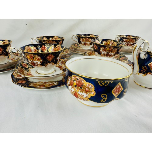 2 - Complete 21 piece Royal Albert -Heirloom, bone china tea set, (a very slight chip on one cup)