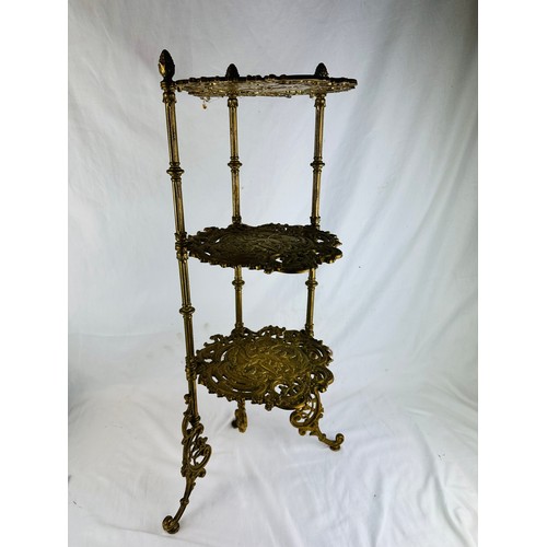 20 - A very decorative three tier brass whatnot, 30''h