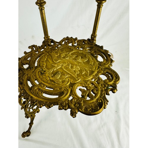 20 - A very decorative three tier brass whatnot, 30''h