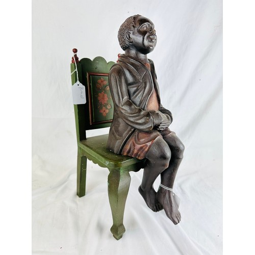 23 - Hand carved vintage boy sitting on a hand crafted chair, 20''h, 2 pieces