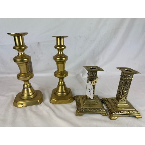 29 - 2 pairs of brass candlesticks 10''h and 6''h