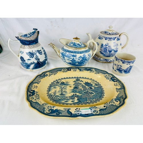 36 - A collection of unusual Victorian willow pattern teapots and platter