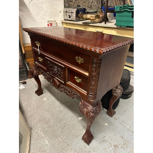 156 - 3 drawer mahogany chest with brass handles and ball and claw feet