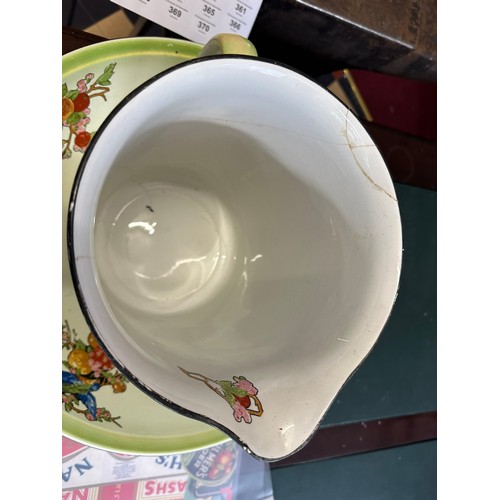 325 - Large jug and basin with repair