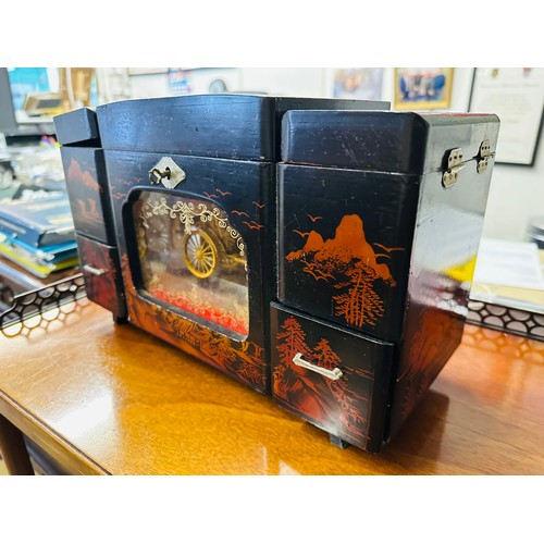 240A - Oriental hand painted musical jewelry box with moving figure inside glass. (Spring needs to be repla... 