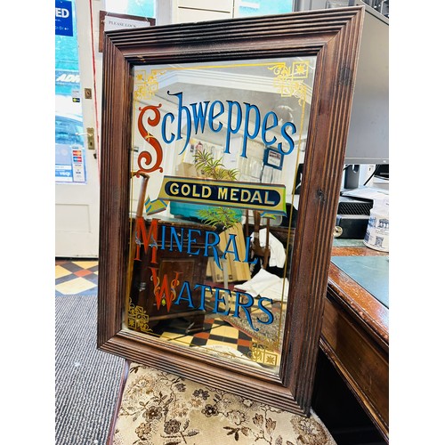 110B - Schweppes Mineral Water, original advertising mirror in an oak frame, 21'' x 16''