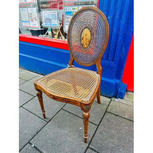 130F - A beautiful Baroque painted satinwood side chair with oval cane back, centered by an oval painted pa... 