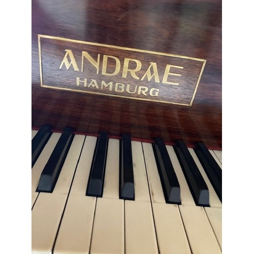 160A - Baby grand piano in a mahogany case, by Andrae Hamburg. In excellent condition. (buyer to arrange co... 