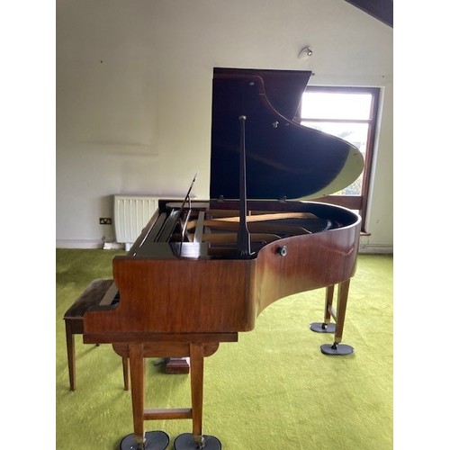 160A - Baby grand piano in a mahogany case, by Andrae Hamburg. In excellent condition. (buyer to arrange co... 