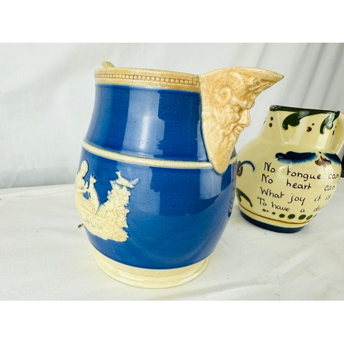 57 - WHISKEY CERAMIC JUGS X2 LARGEST H17CM W15CM