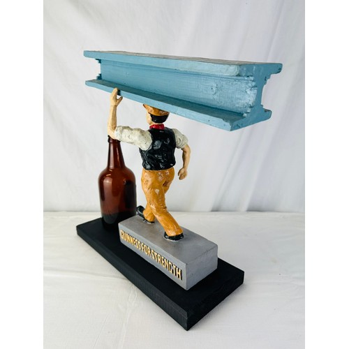 88 - GUINNESS FOR STRENGTH GIRDER MAN RESIN ADVERTISING RESIN FIGURE
MOUNTED ON WOOD WITH OLD GUINNESS BO... 