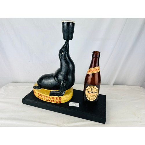 94 - MY GOODNESS MY GUINNESS, GUINNESS SEAL ADVERTISING RESIN
FIGURE MOUNTED ON WOOD WILL OLD GUINNESS BO... 