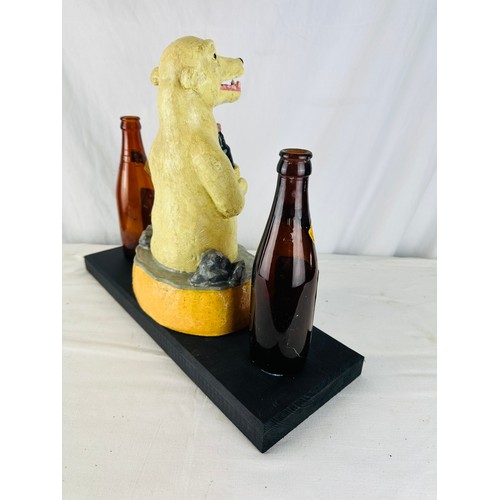 254 - MY GOODNESS MY GUINNESS POLAR BEAR  ADVERTISING RESINFIGURE
MOUNTED ON WOOD WITH 2 OLD GUINNESS BOTT... 