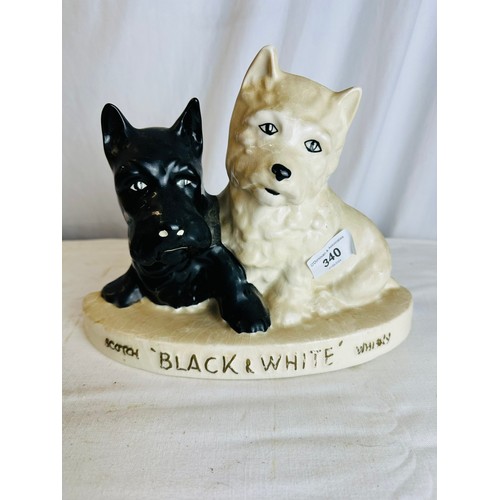 340 - OLD BLACK AND WHITE WHISKEY CERAMIC FIGURINE 21 X 27 X8