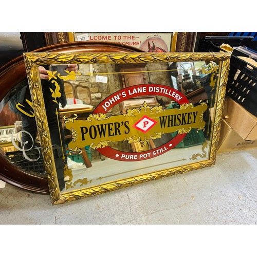 113 - POWERS WHISKEY MIRROR WITH ORNATE CARVED FRAME