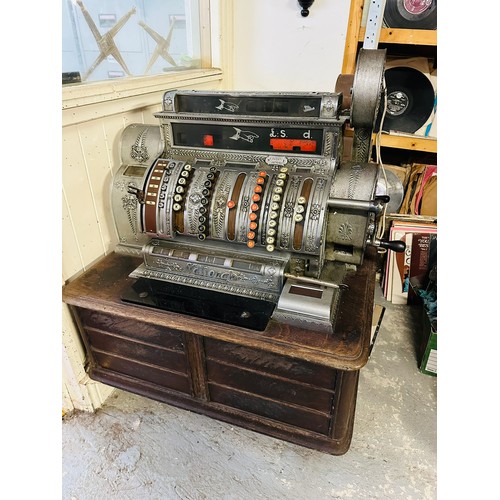 395 - Metal case, cash register with 6 drawers, display in £. Wooden substructure with 6 drawers. 31''w x ... 