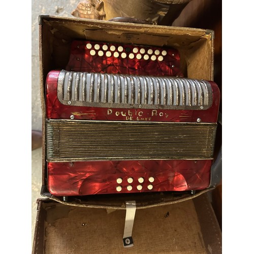 397 - DE LUXE DOUBLE RAY BUTTON ACCORDIAN AND CASE