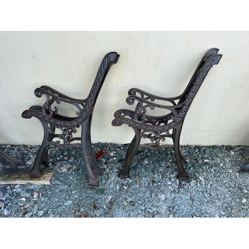 54 - 2 PAIRS OF CAST IRON SEAT ENDS