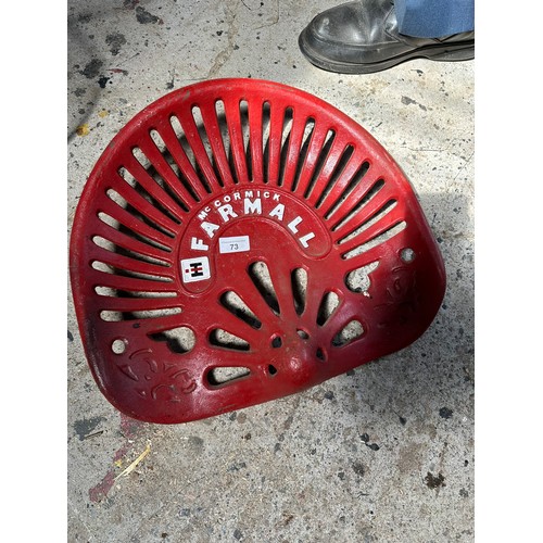 73 - MCCORMICK FARMALL CAST IRON SEAT