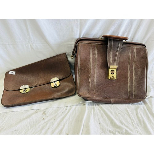 75 - A collection of 2 leather brief cases
