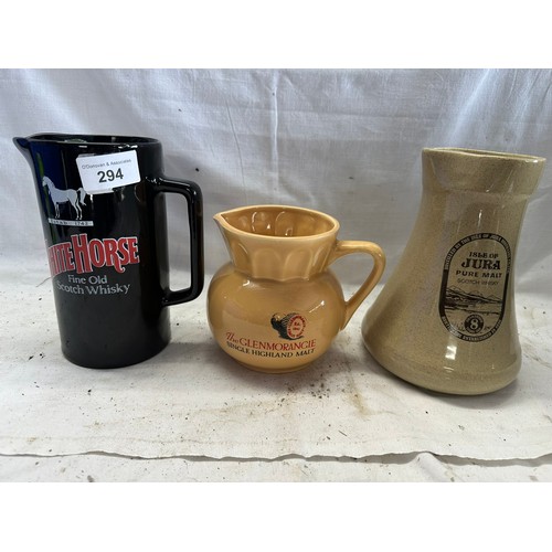 294 - A COLLECTION OF 3 CERAMIC PUB JUGS, TALLEST 18CM