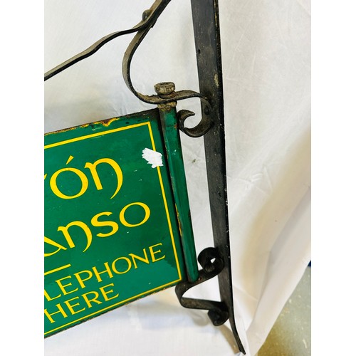 125 - VINTAGE 1940'S ENAMEL SIGN 'YOU MAY TELEPHONE FROM HERE' WITH ORIGINAL CAST IRON WALL HANGER, (SIGN ... 