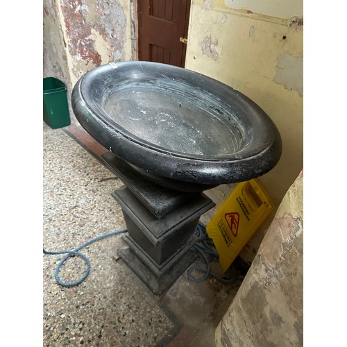 241 - Magnificent black marble (we assume its marble) oval holy water font, 23''w x 32''w x 40''h