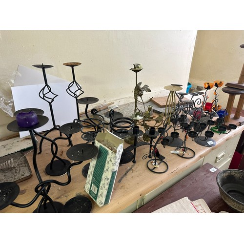 245 - A collection of candle holders