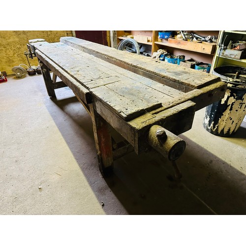 288 - Vernacular carpenters work bench with vice Paramo No. 51 and a handmade wooden vice, 9'8'' long