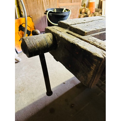 288 - Vernacular carpenters work bench with vice Paramo No. 51 and a handmade wooden vice, 9'8'' long