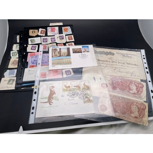 16 - Folio of vintage stamps etc.