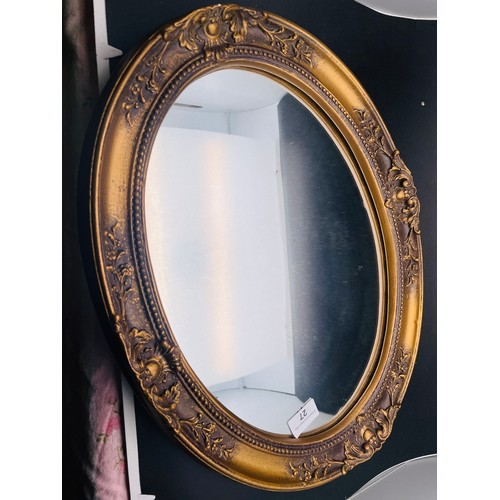 27 - Oval gilt mirror, 19'' x 14'.5''