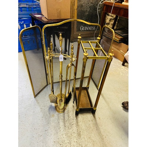 35 - A collection of brass fire irons, fire screen and other