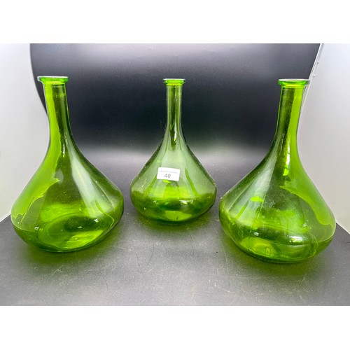 40 - A collection of 3 vintage green bottles