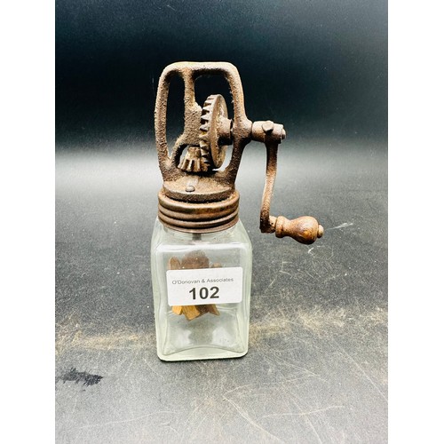 102 - A sales reps. glass butter churn, 6''