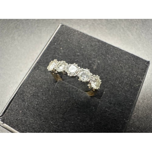 139 - 18 carat gold diamond ring, comprising of an 18 ct. yellow gold band accompanied by an 18ct white go... 