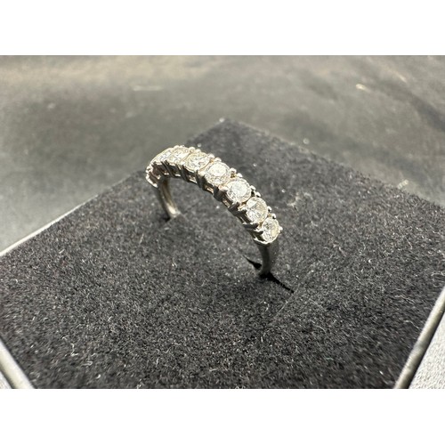 140 - 18 carat gold and diamond ring omprising of an all 18ct white gold mount with 9 brilliant cut diamon... 