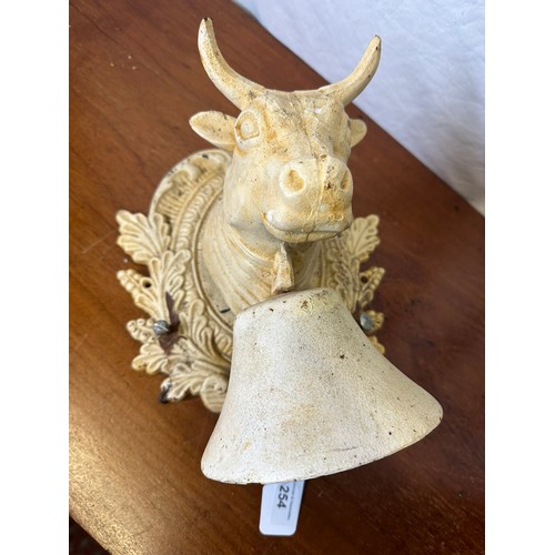 254 - Heavy iron bell depicting a bull, 12''