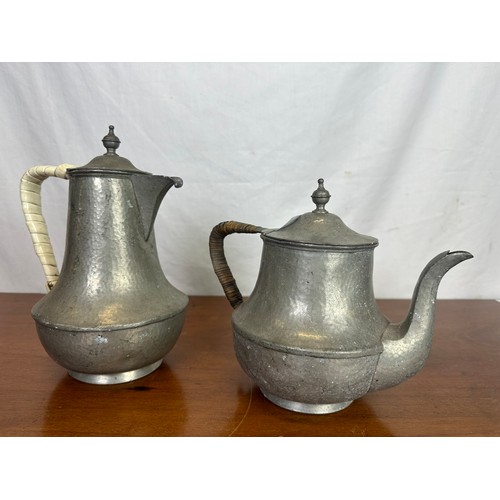 1 - A hand beaten petwer teapot and coffee pot