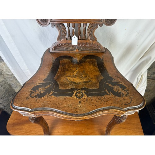 300 - Black Forest Musical Chair (missing components), heavily inlaid with fighting hares with a hinged se... 